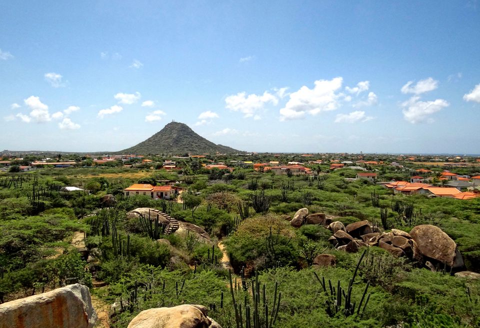 The Hooiberg hill rising over Aruba